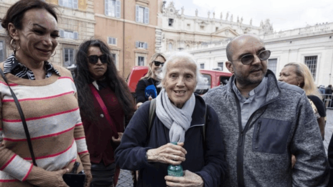 What were some trans activists doing at the Pope's lunch with the poor?